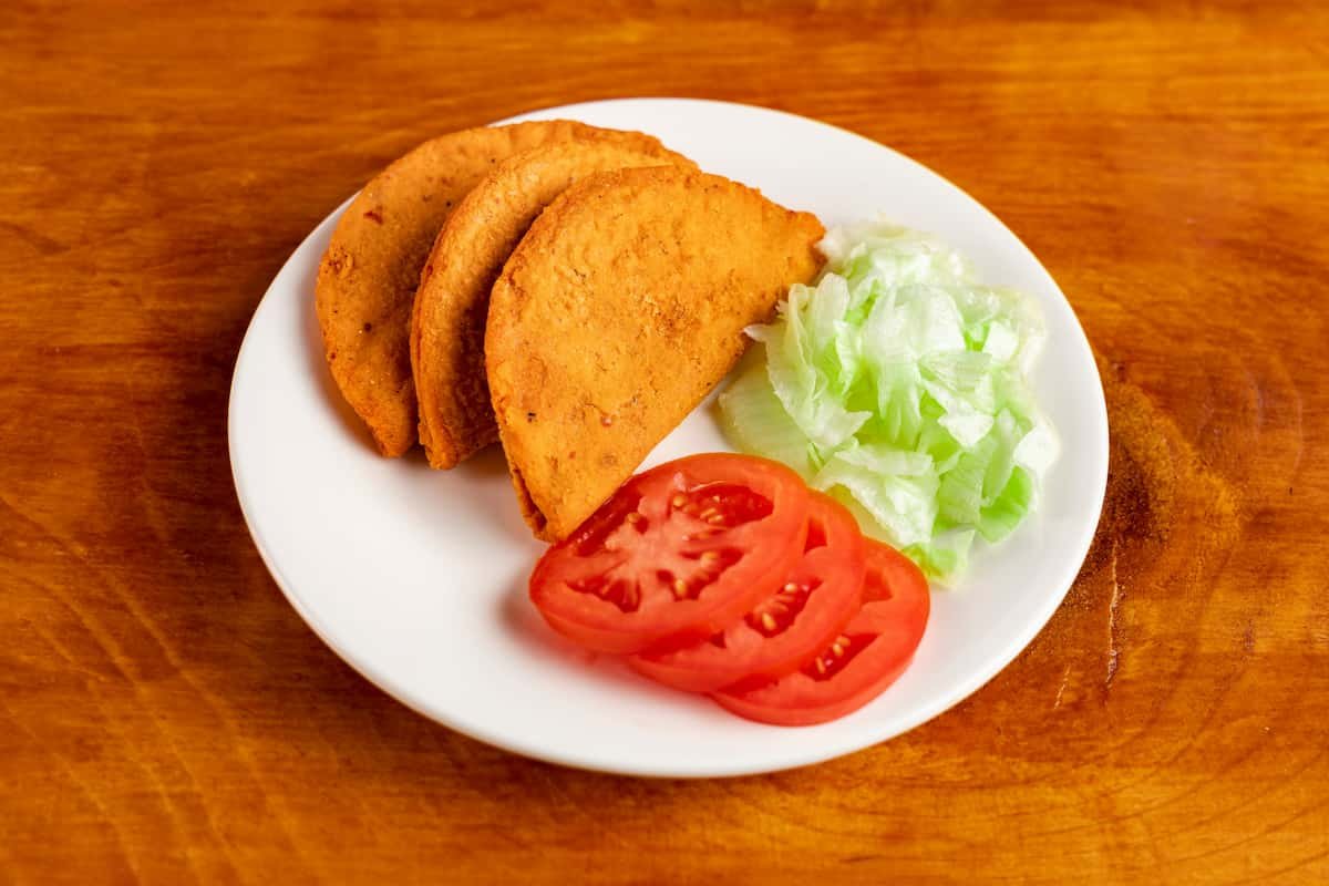 cuál es la diferencia entre las enchiladas queretanas y las potosinas?